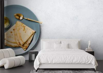 Homemade pancakes and honey on a plate Wall mural