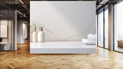 Bathroom accessories on a shelf in front of a white wall with copy space Wall mural