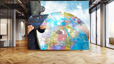 Businessman using tablet. World connected, social network concept Wall mural