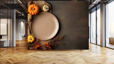 Flat lay composition of autumn harvest pottery and copy space. Rustic stoneware with fall decor. Neutral plate on neutral background with pumpkins and herbs. Wabi sabi potteryn. Food blog concept Wall mural