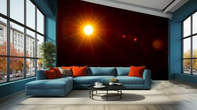 Sun flare on the black background Wall mural