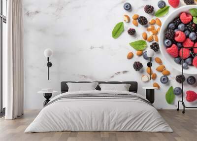 Top view photo of mix of fresh fruit and nuts on white background, healthy food concept Wall mural