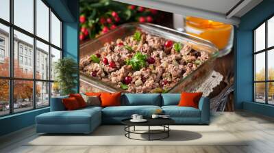 Ground meat stewed with apples, cranberries, herbs Wall mural