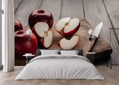 Peel and sliced apples on a kitchen board Wall mural