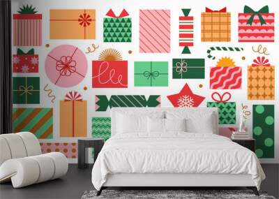 Vector set of different colorful Christmas gift boxes isolated on white background. Modern mid century clip art of present boxes in red, green, pink and gold colors. Wall mural