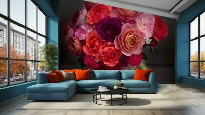 bouquet of roses of different color and shape in a vase with elegant and classic decorative style Wall mural