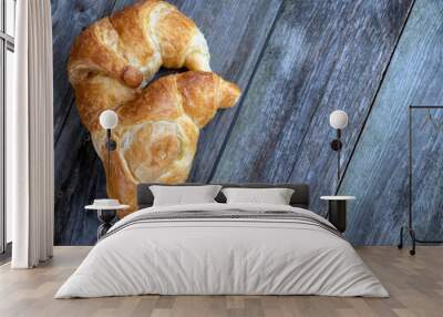 fresh french croissants on wooden ground Wall mural