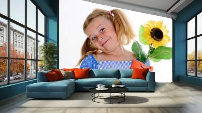 little smiling girl with pigtails and sunflower Wall mural