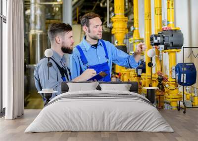 two worker in industrial plant Wall mural