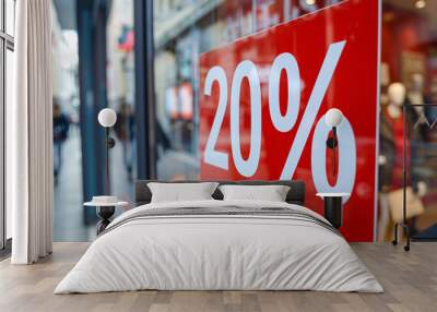 Red sale sign with text '20%' in shopping window Wall mural