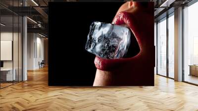 Ice cube in woman's mouth. Wall mural