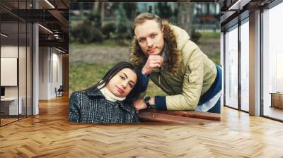 Portrait of a young couple in love in the city Wall mural