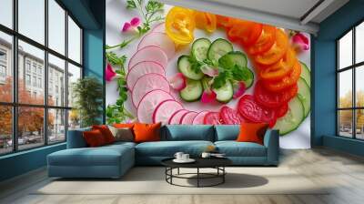 An artistic arrangement of sliced vegetables on a white plate, featuring radishes, cucumbers, and bell peppers, creating a beautiful pattern Wall mural