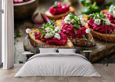 Bruschetta with beet hummus, goat cheese, and fresh herbs, set against a rustic background Wall mural