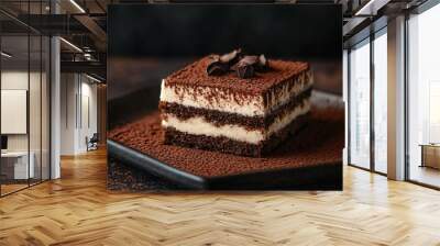 Tiramisu slice with a rich cocoa topping, set against a dark, moody backdrop with dramatic shadows Wall mural