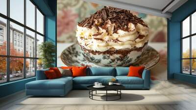 Tiramisu with chocolate shavings on top, set against a vintage floral wallpaper backdrop Wall mural