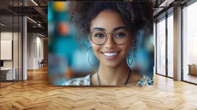  Inclusive image of happy blasian woman working on computer in creative agency office workplace. Young successful mixed race female businesswoman talking on client video call team meeting Wall mural