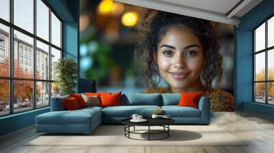  Inclusive image of happy blasian woman working on computer in creative agency office workplace. Young successful mixed race female businesswoman talking on client video call team meeting Wall mural