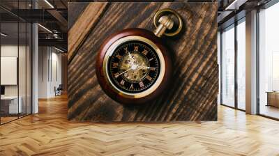 Old pocket watch on wood Wall mural