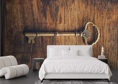 Vintage key on old wood Wall mural