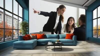 Angry mad female HR representative pointing at door, asking male job candidate to leave, making verbal sign. Applicant show no respect, ignoring requests. Dismissal, bad interview, annoyed employers. Wall mural