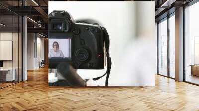 Close up on professional dslr camera filming new videovlog woman vlogger. Business coach gives lecture, live training on-line, commercial ad concept. Horizontal photo banner for website header design Wall mural