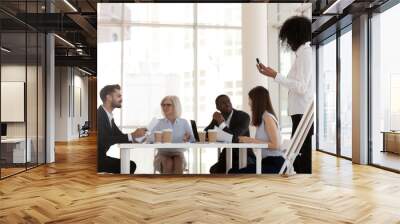 Diverse business team during meeting in office conference room Wall mural