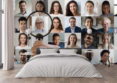 Employer hand holding magnifying glass choosing old middle aged female candidate among young multiethnic professional people faces collage. Human resource, headhunting, senior job opportunity concept. Wall mural