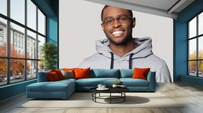 Head shot portrait smiling African American man wearing glasses Wall mural