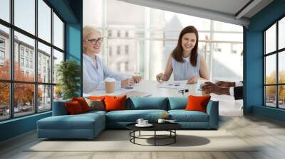 Meeting of businesspeople in modern light boardroom Wall mural