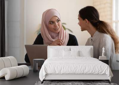 Multicultural businesswomen brainstorm cooperating at office meeting Wall mural