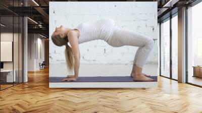 Pregnancy Yoga and Fitness concept. Portrait of young pregnant yoga model working out indoors. Pregnant happy fitness person practicing yoga at home. Prenatal Table Top Pose. Full length Wall mural