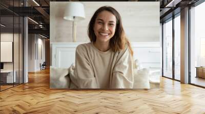 Screen view of happy millennial Hispanic woman look at camera have webcam online digital conference. Portrait of smiling young female speak talk on video call at home. Virtual event concept. Wall mural