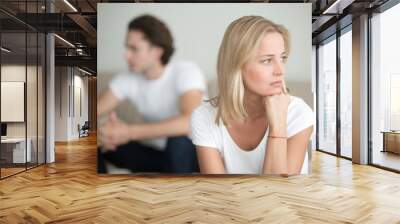 Serious sad woman thinking over a problem, man aside, meeting therapist, poor chance of getting pregnant after 40, unmet expectations, unable to handle family finances, interested in different things Wall mural