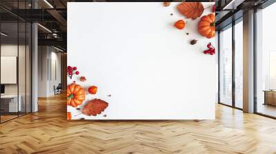 Autumn composition. Dried leaves, pumpkins, flowers, rowan berries on white background. Autumn, fall, halloween, thanksgiving day concept. Flat lay, top view, copy space Wall mural