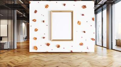 autumn composition. photo frame, dried flowers and leaves on white background. autumn, fall concept. Wall mural