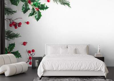 Christmas composition. Frame made of christmas plants on white background. Flat lay, top view, copy space Wall mural