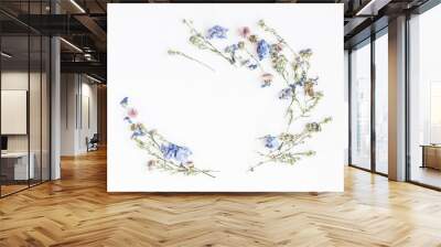 Flowers composition. Frame made of dried flowers on white background. Flat lay, top view Wall mural