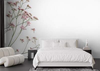 Flowers composition. Pink flowers on white background. Flat lay, top view Wall mural