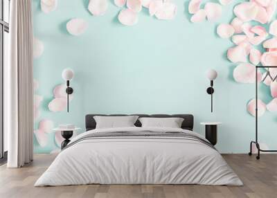 Flowers composition. Rose flower petals on pastel blue background. Valentine's Day, Mother's Day concept. Flat lay, top view, copy space Wall mural