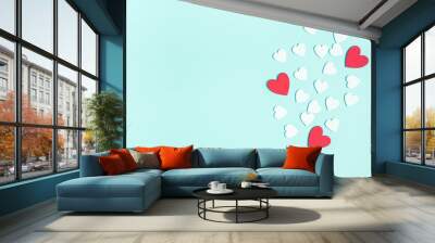 Valentine's Day background. White and red hearts on pastel blue background. Valentines day concept. Flat lay, top view, copy space Wall mural