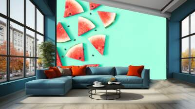 Watermelon pattern. Red watermelon on mint background. Summer concept. Flat lay, top view, copy space Wall mural