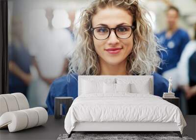 blonde female medic in hospital looking at camera Wall mural