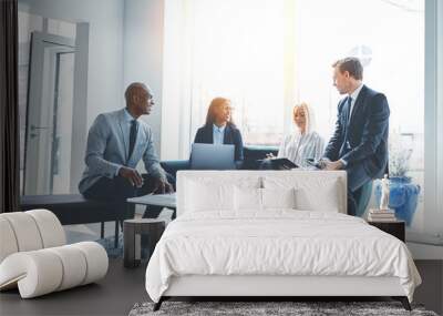 Diverse businesspeople having a meeting together on an office so Wall mural