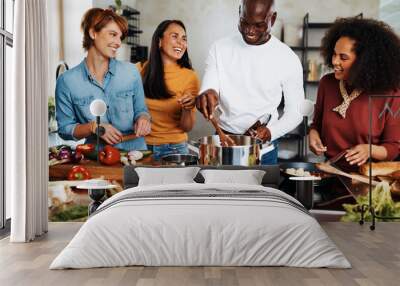 Diverse friends cooking together Wall mural