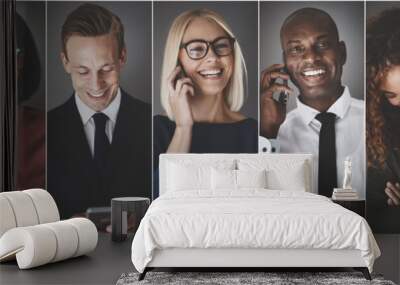 Diverse group of smiling business professionals using cellphones Wall mural