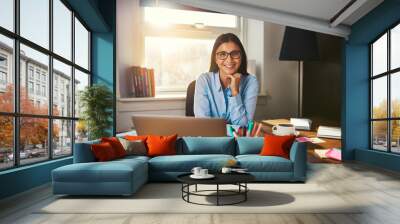 Female entrepreneur sitting at desk Wall mural