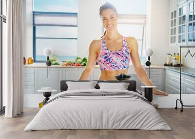 fit healthy young woman with a lovely smile Wall mural