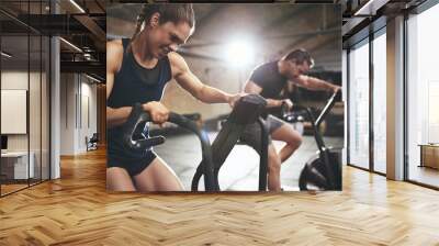 Fit people in gym while hard training Wall mural