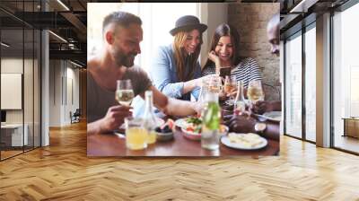 Four? having dinner and sharing news Wall mural